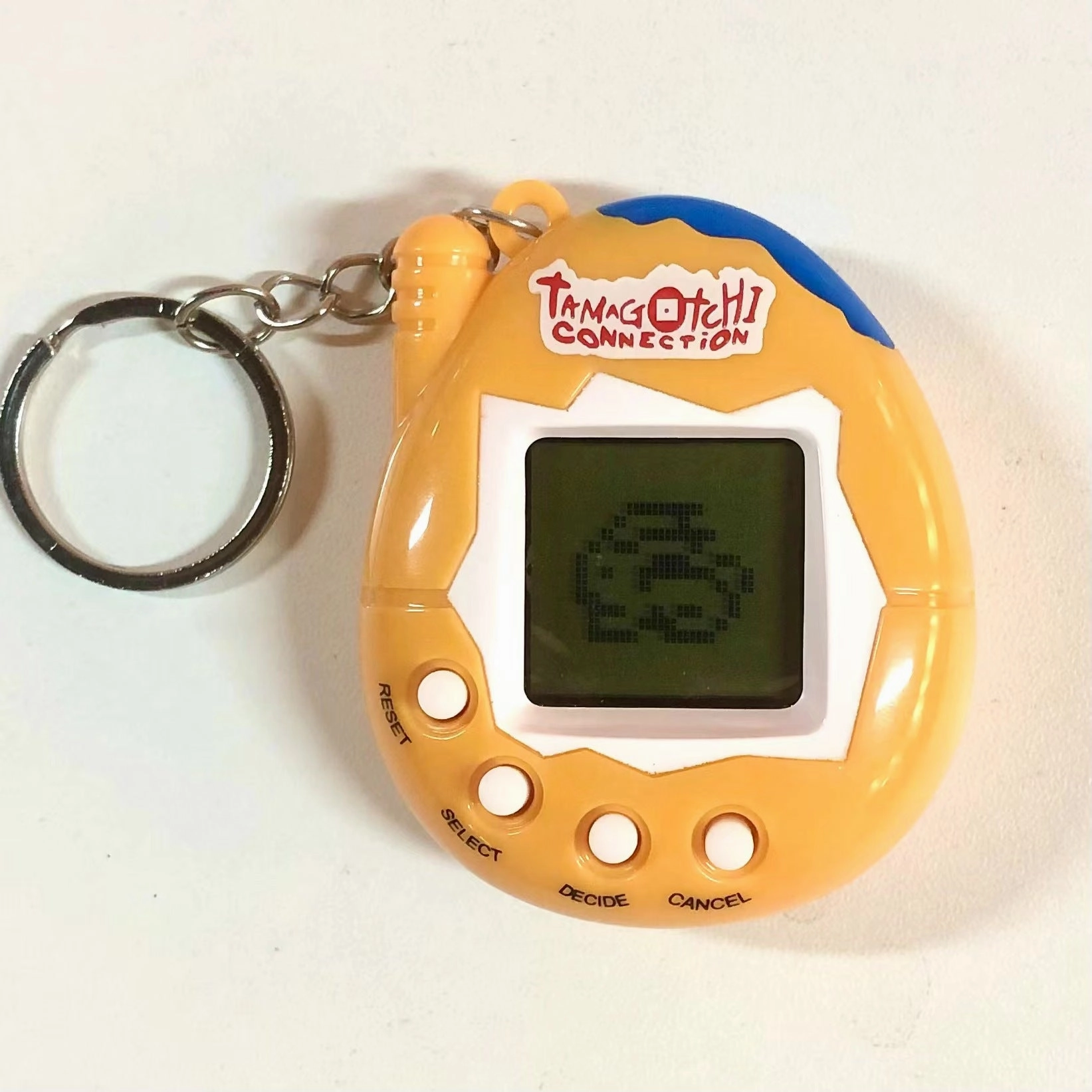 Wholesale hot sale children's miniature virtual pet developing game machine electric classic nostalgic handheld mini pet machine